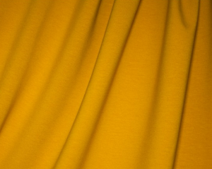 mustard-colored knit fabrics